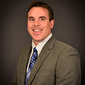 Headshot of man in suit